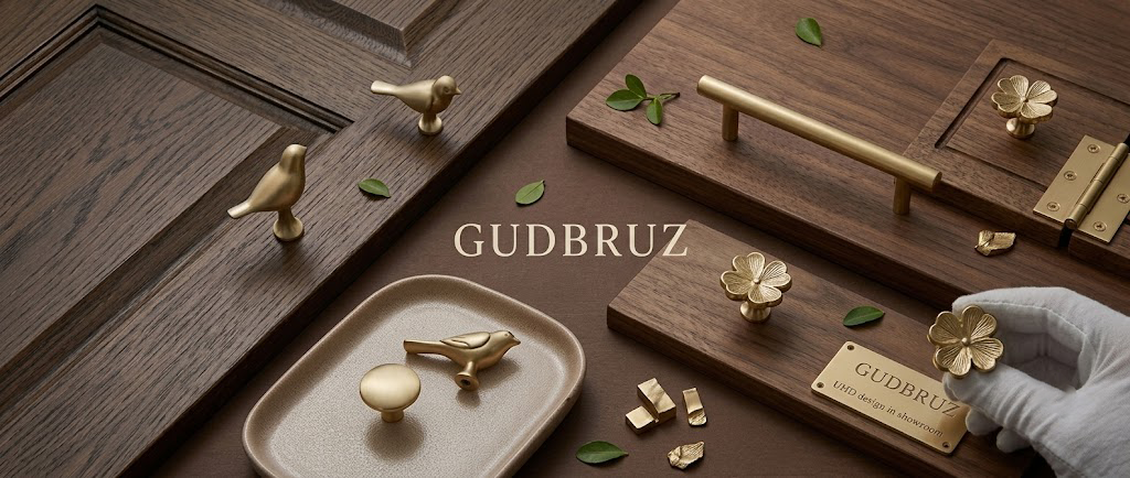 GUDBRUZ brass hardware displayed on wood panels